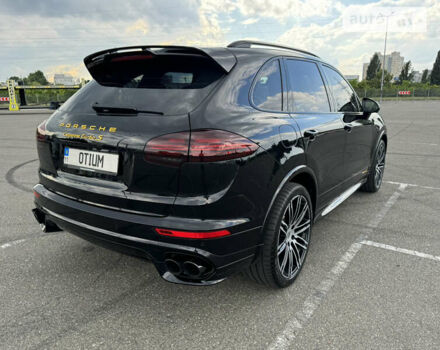 Черный Порше Каен, объемом двигателя 4.81 л и пробегом 100 тыс. км за 51000 $, фото 4 на Automoto.ua