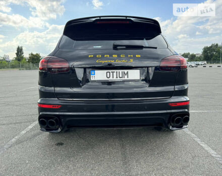 Черный Порше Каен, объемом двигателя 4.81 л и пробегом 100 тыс. км за 51000 $, фото 3 на Automoto.ua