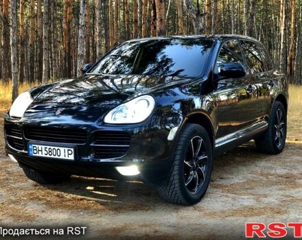 Черный Порше Каен, объемом двигателя 3.2 л и пробегом 210 тыс. км за 8300 $, фото 1 на Automoto.ua