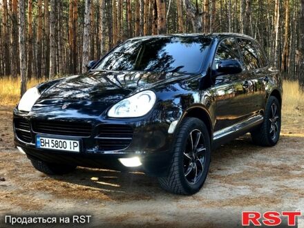 Черный Порше Каен, объемом двигателя 3.2 л и пробегом 210 тыс. км за 8300 $, фото 1 на Automoto.ua