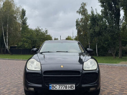 Черный Порше Каен, объемом двигателя 4.5 л и пробегом 232 тыс. км за 5950 $, фото 1 на Automoto.ua