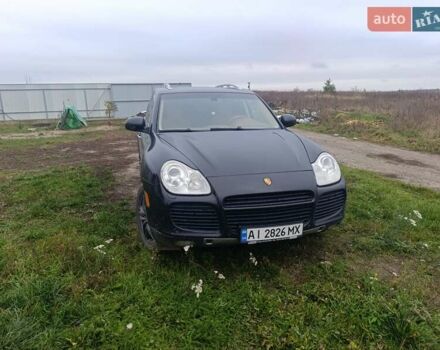 Чорний Порше Cayenne, об'ємом двигуна 4.51 л та пробігом 273 тис. км за 10500 $, фото 1 на Automoto.ua