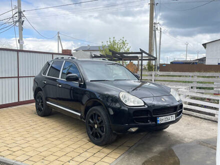 Черный Порше Каен, объемом двигателя 3.2 л и пробегом 300 тыс. км за 7800 $, фото 1 на Automoto.ua