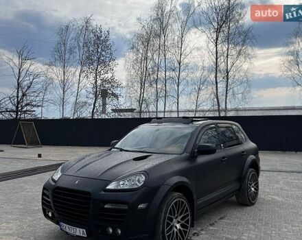 Черный Порше Каен, объемом двигателя 4.81 л и пробегом 250 тыс. км за 10650 $, фото 1 на Automoto.ua