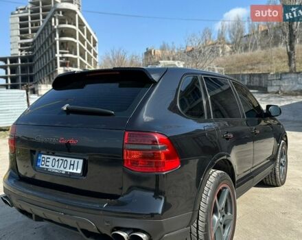Черный Порше Каен, объемом двигателя 4.81 л и пробегом 223 тыс. км за 9500 $, фото 1 на Automoto.ua