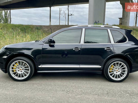 Черный Порше Каен, объемом двигателя 4.81 л и пробегом 125 тыс. км за 17500 $, фото 1 на Automoto.ua