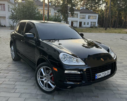 Черный Порше Каен, объемом двигателя 4.8 л и пробегом 85 тыс. км за 12500 $, фото 1 на Automoto.ua