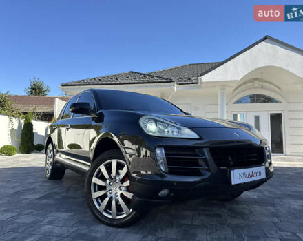 Черный Порше Каен, объемом двигателя 3 л и пробегом 173 тыс. км за 14950 $, фото 1 на Automoto.ua