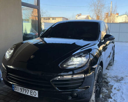 Черный Порше Каен, объемом двигателя 4.8 л и пробегом 200 тыс. км за 18000 $, фото 1 на Automoto.ua