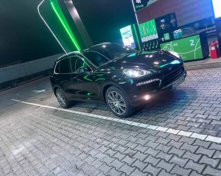 Черный Порше Каен, объемом двигателя 3 л и пробегом 160 тыс. км за 23900 $, фото 1 на Automoto.ua