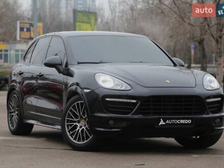 Черный Порше Каен, объемом двигателя 4.81 л и пробегом 152 тыс. км за 21900 $, фото 1 на Automoto.ua