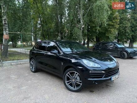 Черный Порше Каен, объемом двигателя 4.2 л и пробегом 257 тыс. км за 27999 $, фото 1 на Automoto.ua
