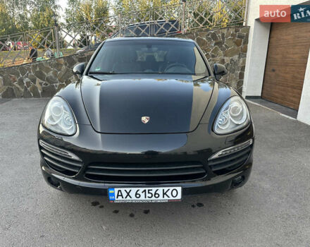 Черный Порше Каен, объемом двигателя 3 л и пробегом 142 тыс. км за 25000 $, фото 1 на Automoto.ua
