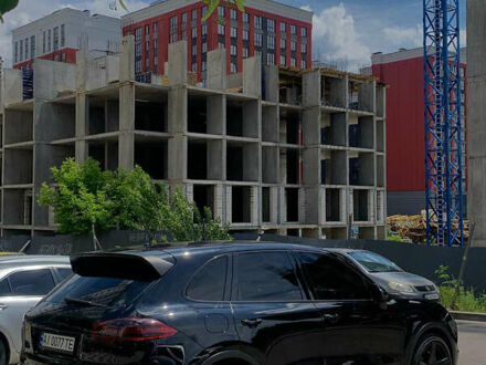 Черный Порше Каен, объемом двигателя 2.97 л и пробегом 140 тыс. км за 32500 $, фото 1 на Automoto.ua