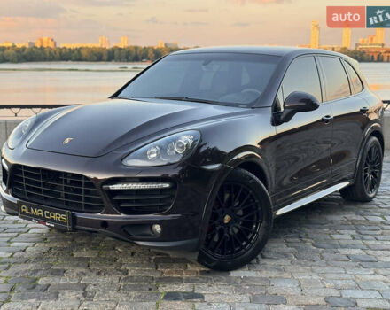 Коричневый Порше Каен, объемом двигателя 4.8 л и пробегом 140 тыс. км за 18500 $, фото 1 на Automoto.ua