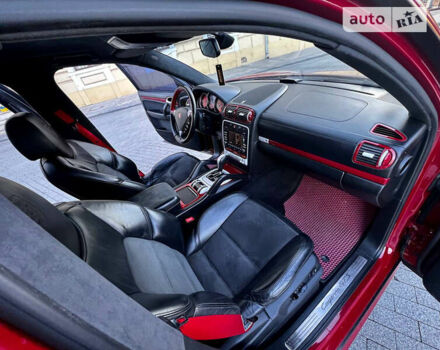 Червоний Порше Cayenne, об'ємом двигуна 4.8 л та пробігом 206 тис. км за 12000 $, фото 21 на Automoto.ua
