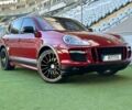 Красный Порше Каен, объемом двигателя 4.8 л и пробегом 225 тыс. км за 9900 $, фото 1 на Automoto.ua