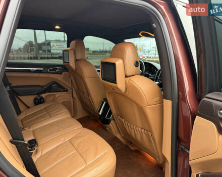 Красный Порше Каен, объемом двигателя 3 л и пробегом 278 тыс. км за 23500 $, фото 11 на Automoto.ua