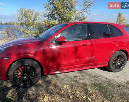 Красный Порше Каен, объемом двигателя 4.81 л и пробегом 118 тыс. км за 29900 $, фото 1 на Automoto.ua