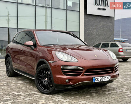 Красный Порше Каен, объемом двигателя 3 л и пробегом 278 тыс. км за 23500 $, фото 1 на Automoto.ua