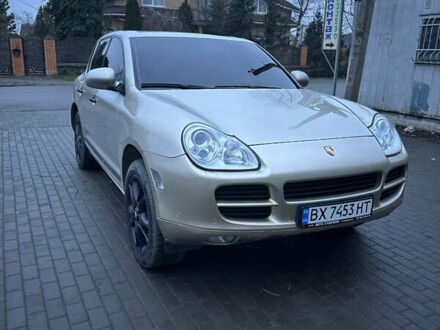 Желтый Порше Каен, объемом двигателя 4.51 л и пробегом 232 тыс. км за 10500 $, фото 1 на Automoto.ua