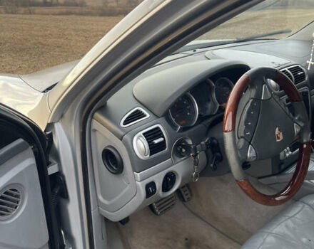 Серый Порше Каен, объемом двигателя 4.5 л и пробегом 265 тыс. км за 9000 $, фото 65 на Automoto.ua