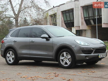 Серый Порше Каен, объемом двигателя 4.81 л и пробегом 84 тыс. км за 24999 $, фото 1 на Automoto.ua