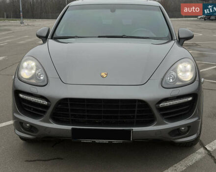 Серый Порше Каен, объемом двигателя 4.81 л и пробегом 84 тыс. км за 29999 $, фото 1 на Automoto.ua