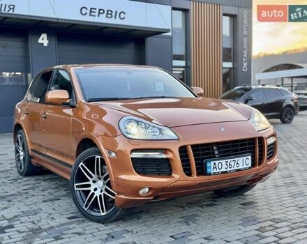 Помаранчевий Порше Cayenne, об'ємом двигуна 4.81 л та пробігом 159 тис. км за 12500 $, фото 1 на Automoto.ua