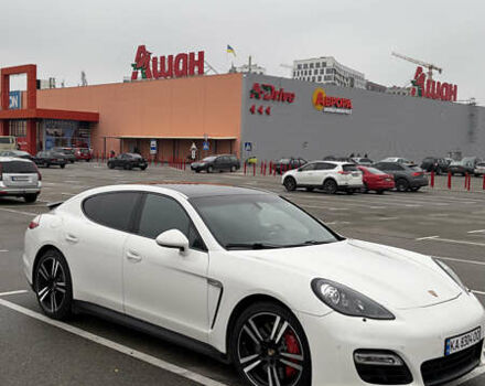 Белый Порше Панамера, объемом двигателя 4.81 л и пробегом 105 тыс. км за 25000 $, фото 1 на Automoto.ua