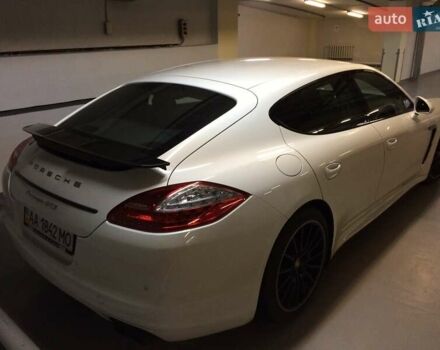 Белый Порше Панамера, объемом двигателя 4.81 л и пробегом 105 тыс. км за 25000 $, фото 1 на Automoto.ua