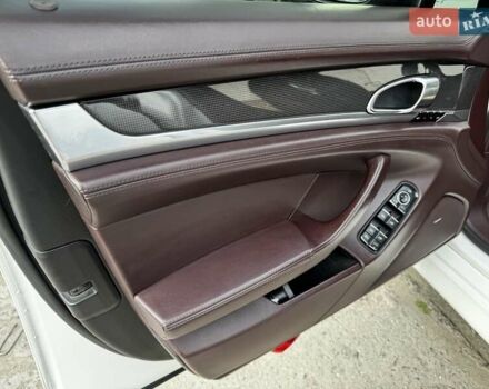 Білий Порше Panamera, об'ємом двигуна 4.81 л та пробігом 130 тис. км за 24850 $, фото 10 на Automoto.ua