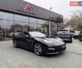 Черный Порше Панамера, объемом двигателя 4.81 л и пробегом 133 тыс. км за 15900 $, фото 1 на Automoto.ua