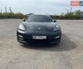 Черный Порше Панамера, объемом двигателя 4.81 л и пробегом 150 тыс. км за 16000 $, фото 1 на Automoto.ua