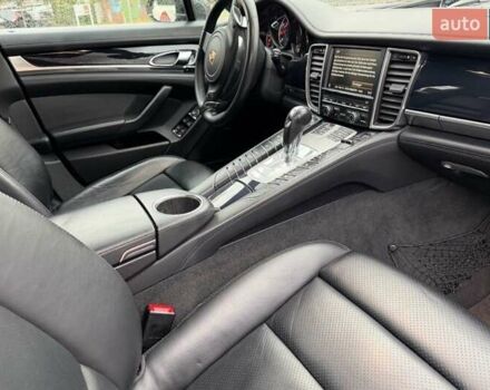 Черный Порше Панамера, объемом двигателя 4.81 л и пробегом 143 тыс. км за 38586 $, фото 5 на Automoto.ua