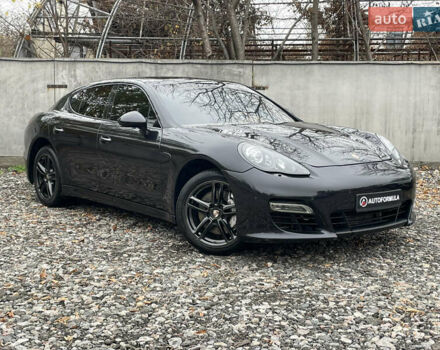 Черный Порше Панамера, объемом двигателя 3 л и пробегом 130 тыс. км за 23490 $, фото 1 на Automoto.ua