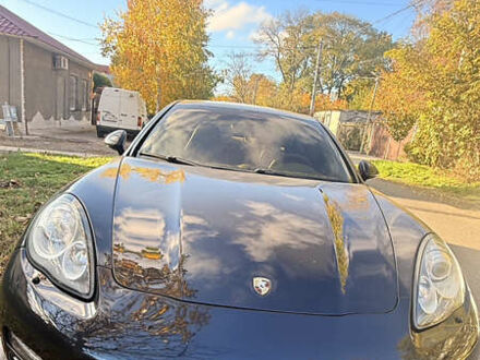 Черный Порше Панамера, объемом двигателя 4.8 л и пробегом 153 тыс. км за 16500 $, фото 1 на Automoto.ua