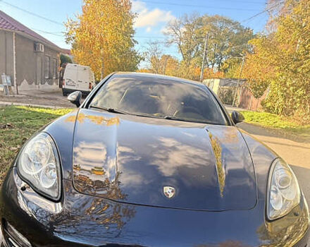 Черный Порше Панамера, объемом двигателя 4.8 л и пробегом 153 тыс. км за 16500 $, фото 1 на Automoto.ua