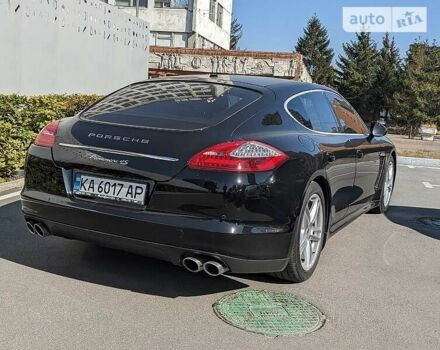 Черный Порше Панамера, объемом двигателя 4.81 л и пробегом 94 тыс. км за 16500 $, фото 1 на Automoto.ua