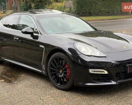 Черный Порше Панамера, объемом двигателя 4.81 л и пробегом 143 тыс. км за 38586 $, фото 1 на Automoto.ua