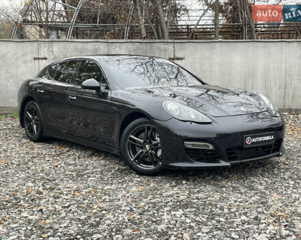 Черный Порше Панамера, объемом двигателя 3 л и пробегом 130 тыс. км за 23490 $, фото 1 на Automoto.ua