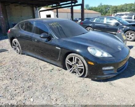 Черный Порше Панамера, объемом двигателя 3.6 л и пробегом 104 тыс. км за 6000 $, фото 1 на Automoto.ua