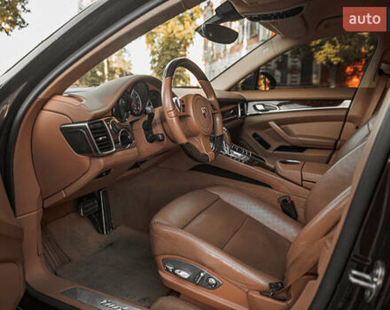 Красный Порше Панамера, объемом двигателя 4.81 л и пробегом 153 тыс. км за 25555 $, фото 17 на Automoto.ua