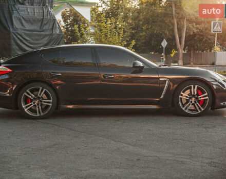 Красный Порше Панамера, объемом двигателя 4.81 л и пробегом 153 тыс. км за 25555 $, фото 3 на Automoto.ua