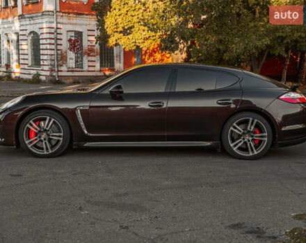 Красный Порше Панамера, объемом двигателя 4.81 л и пробегом 153 тыс. км за 25555 $, фото 5 на Automoto.ua