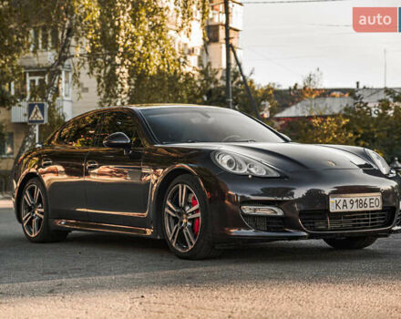 Красный Порше Панамера, объемом двигателя 4.81 л и пробегом 153 тыс. км за 25555 $, фото 1 на Automoto.ua
