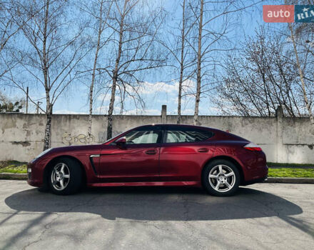 Красный Порше Панамера, объемом двигателя 3.6 л и пробегом 161 тыс. км за 29000 $, фото 1 на Automoto.ua
