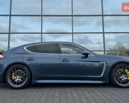 Синий Порше Панамера, объемом двигателя 4.81 л и пробегом 140 тыс. км за 42399 $, фото 1 на Automoto.ua