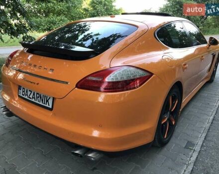 Оранжевый Порше Панамера, объемом двигателя 3.61 л и пробегом 297 тыс. км за 13500 $, фото 1 на Automoto.ua