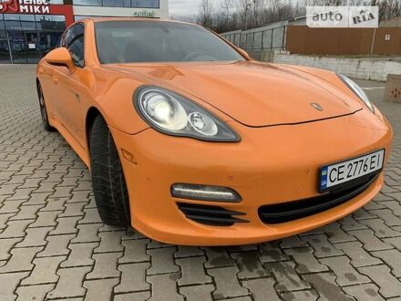Оранжевый Порше Панамера, объемом двигателя 3.6 л и пробегом 280 тыс. км за 34500 $, фото 1 на Automoto.ua